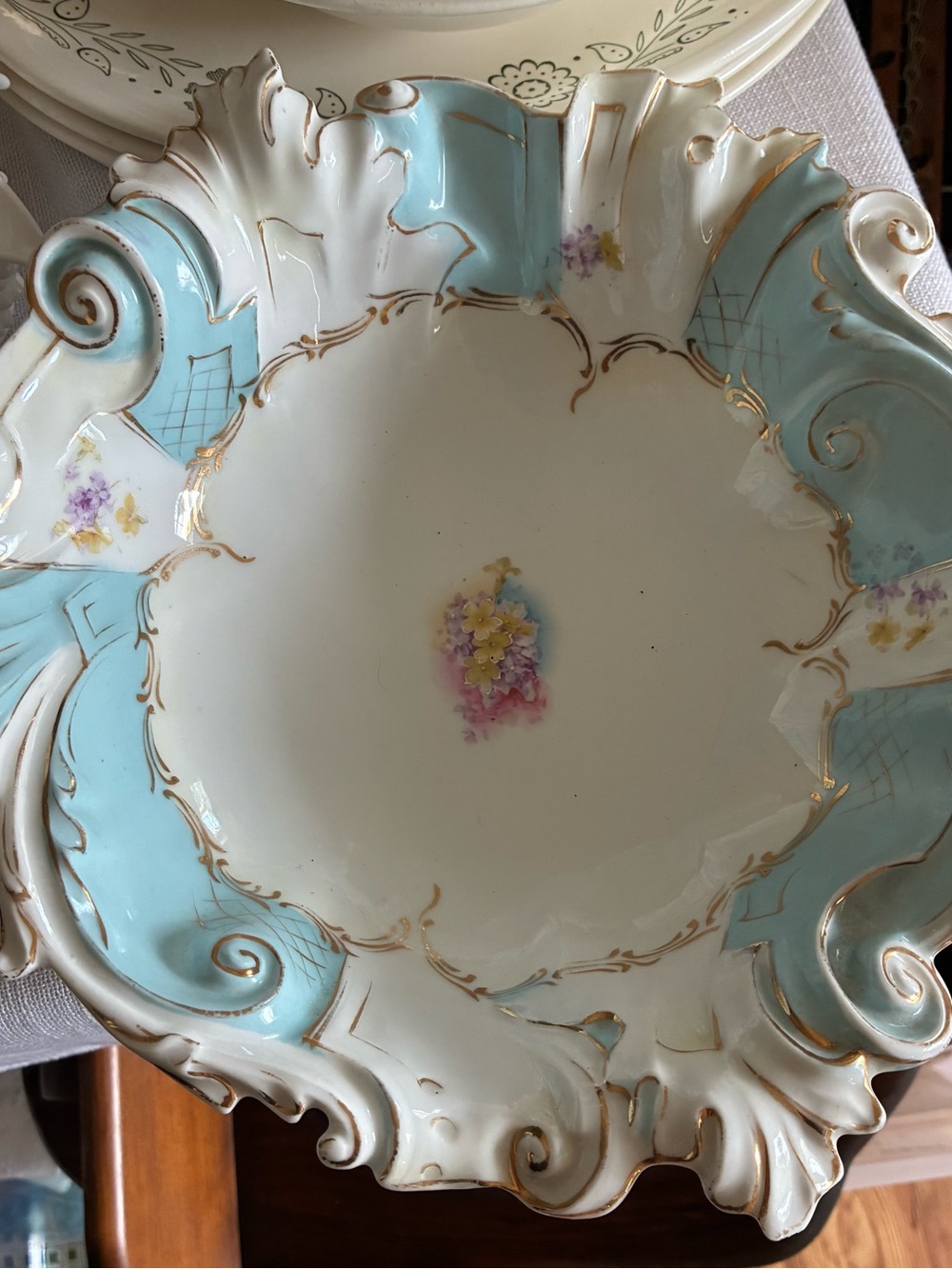 Ornate Ceramic Decorative Bowl in Light Blue and White with Floral Accent